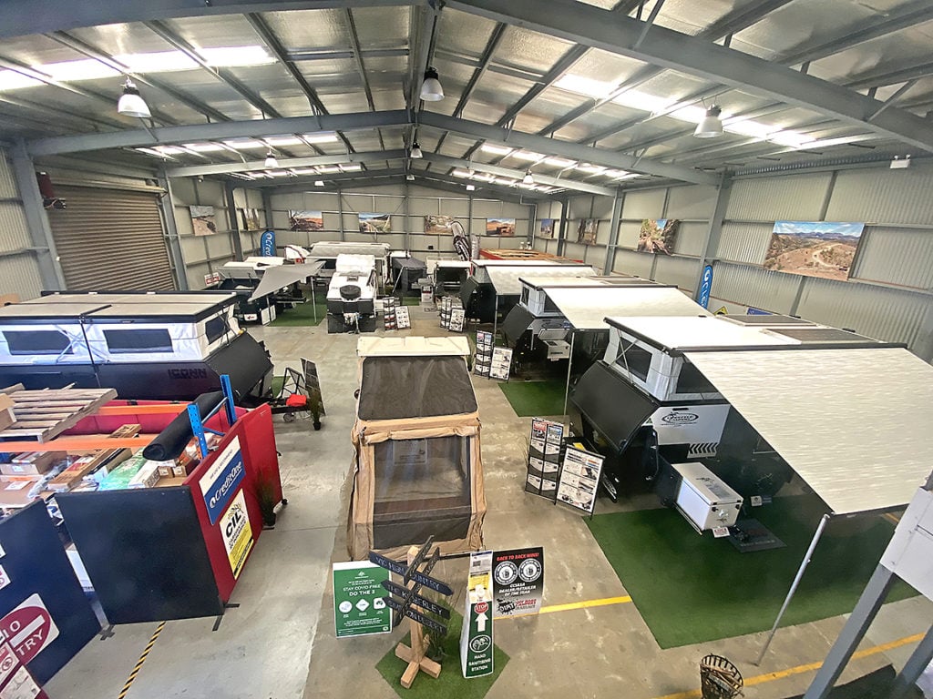 Campers lined up inside the undercover showroom