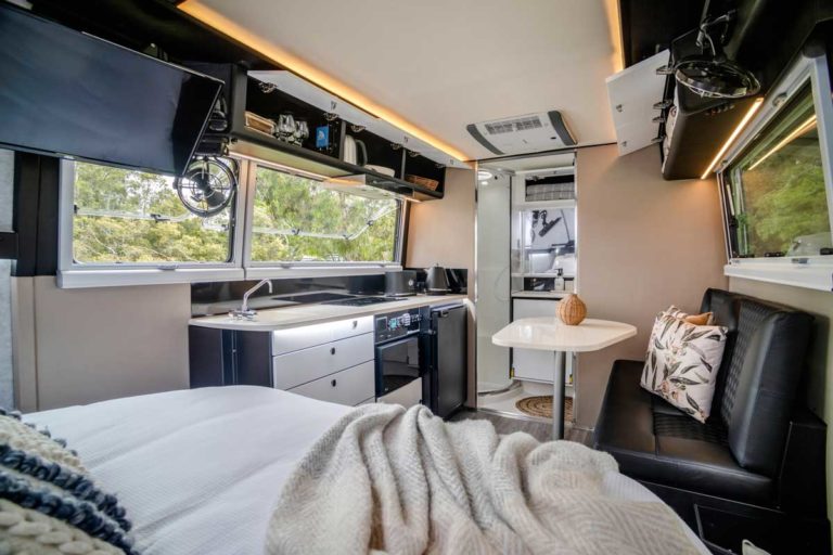 Kimberley-Kampers-Kruiser-E-Class-luxury-caravan-interior-bed-view-to-door-1200px