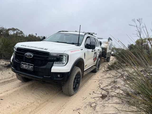 Ford Everest Tremor towing a Mk6 Tvan Murranji along the Border Track during a fully loaded Canning Stock Route shakedown.