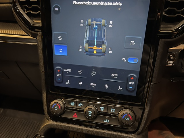 Ford Everest Tremor infotainment screen displaying Sand Mode, rear differential lock engagement and tyre pressure monitoring